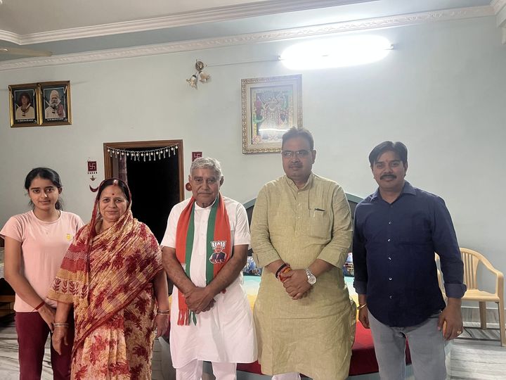 May be an image of 6 people, people smiling and temple